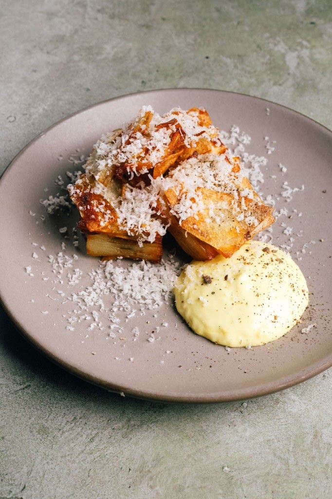 Crispy parmesan potato galette with aioli at Stone House catering
