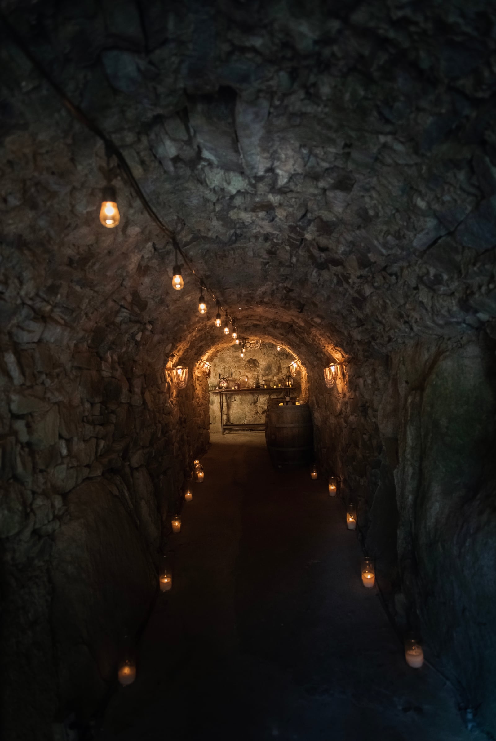 Original 1800s stone arches in The Cavern at Stone House Nevada City — underground event space interior