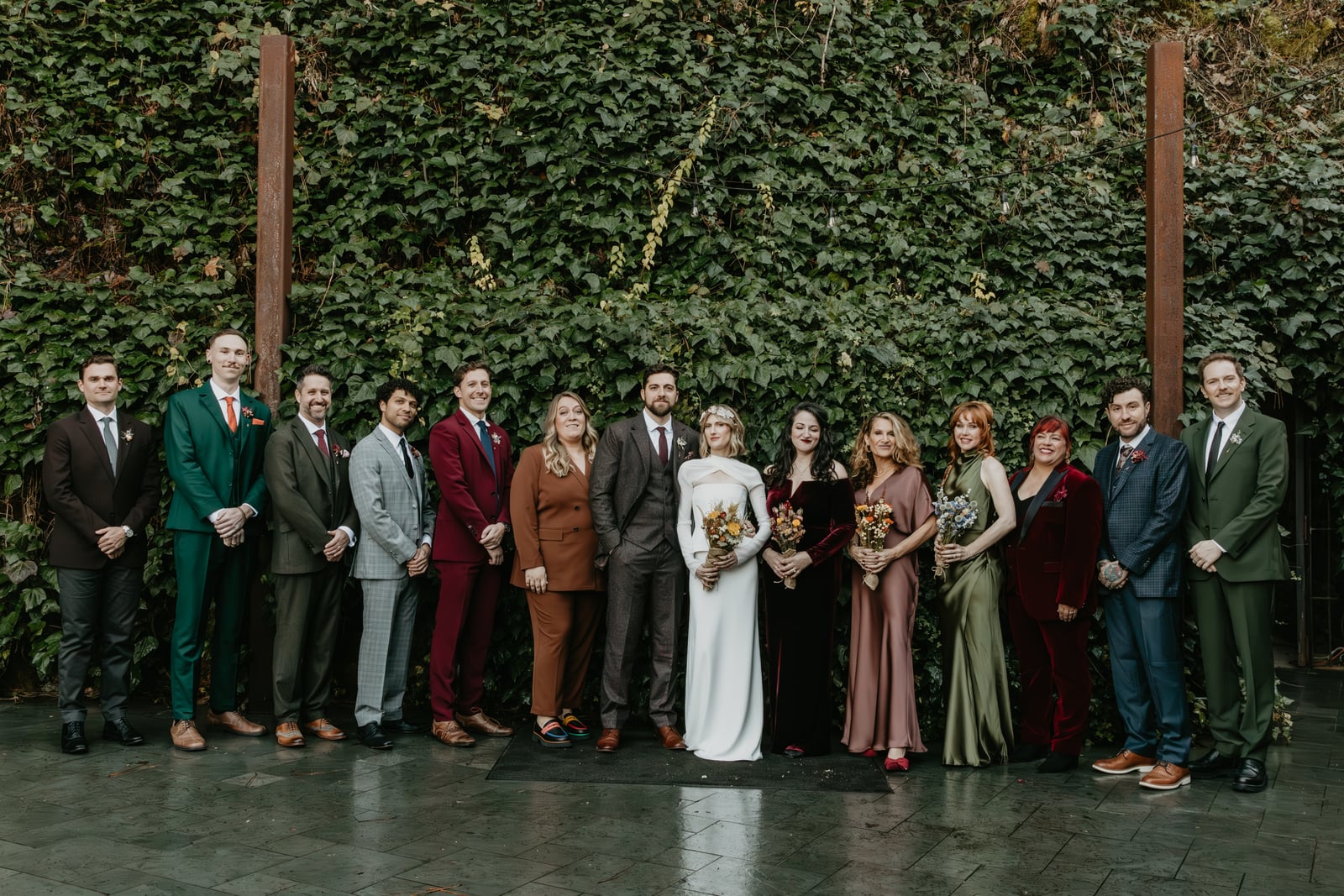 Ceremony aisle in The Courtyard at Stone House Nevada City — outdoor wedding under original 1857 stone walls