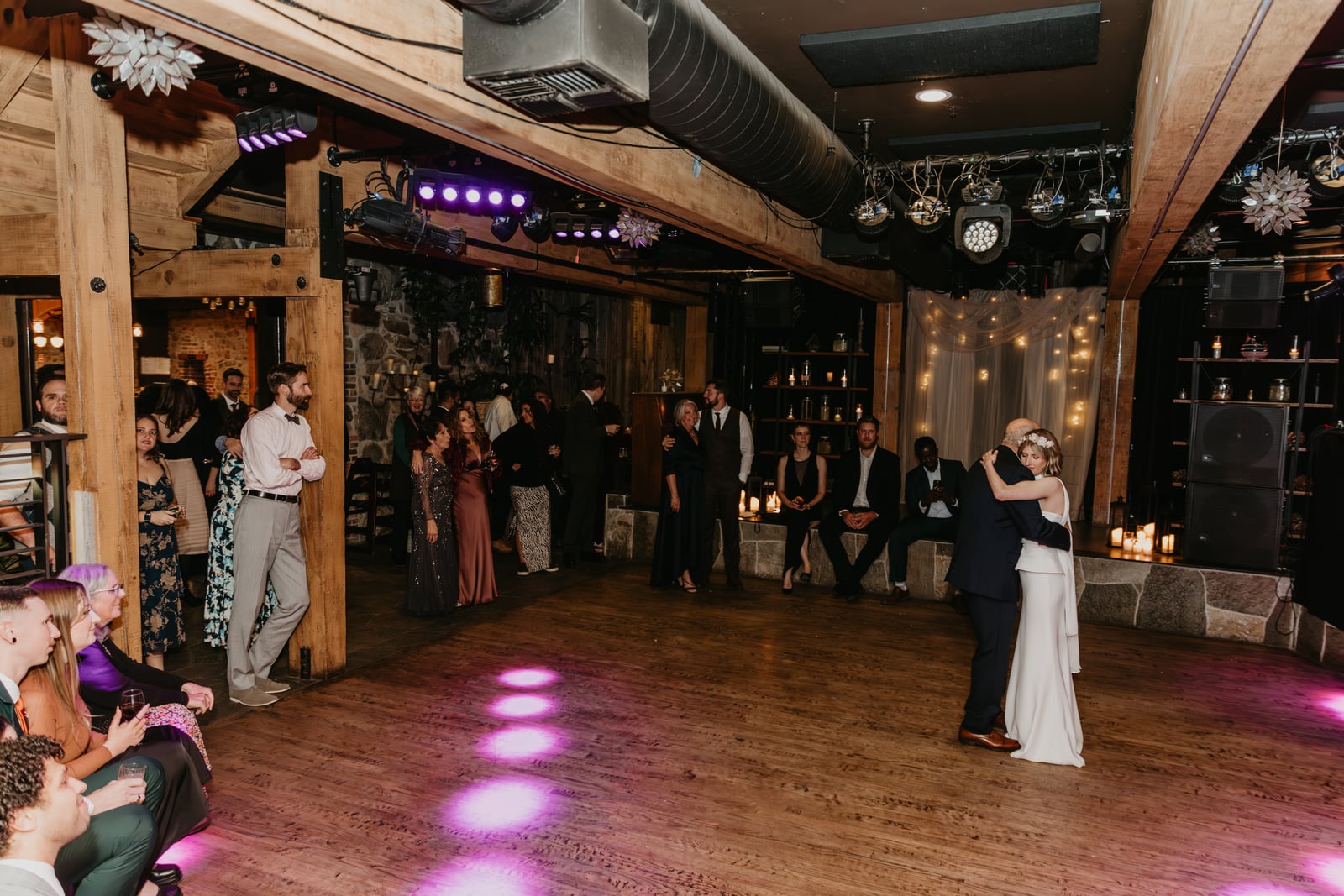 Evening event in The Showroom at Stone House Nevada City — flexible first-floor reception venue with stage
